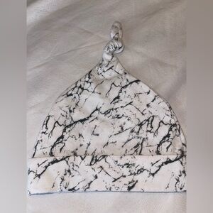By NTD Marble Print Knot Baby Hat in White and Black